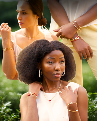 Women standing outdoors with a focus on their jewellery.