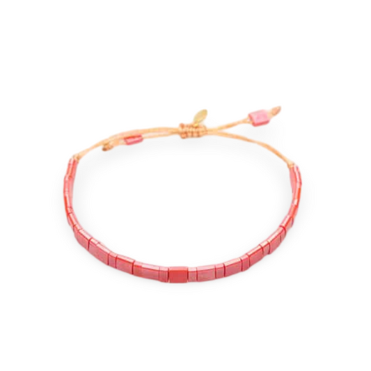 Blush pink beaded necklace inspired by Japanese blossoms—pairs perfectly with Livi Road