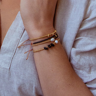 Café Florence Black and Gold Bracelet Stack