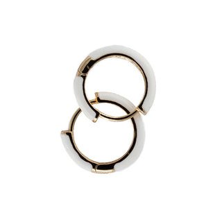 White resin hoop earrings with a polished gold interior, offering a clean contemporary design for everyday wear.