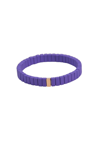 A rich violet stretch bracelet featuring sleek resin segments and a signature gold detail.
