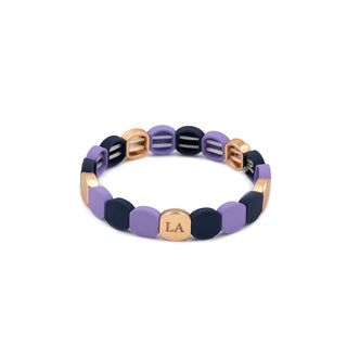 Tribal Mosaic Bracelet featuring alternating lavender and deep navy resin tiles accented with warm gold-toned details.