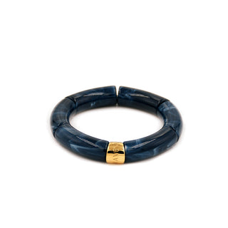 Deep navy marbled resin bracelet with smooth rounded links and a polished gold Leigh Avenue accent, combining rich colour with a timeless contemporary design.