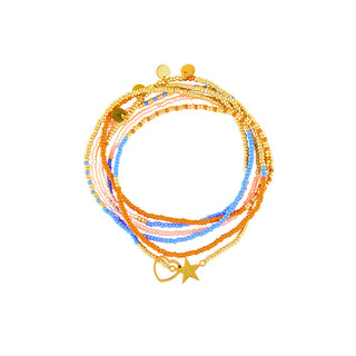 Multi-strand beaded necklace featuring vibrant blue, coral orange, blush pink, and polished gold beads, finished with delicate gold disc charms and a gold star pendant for a playful layered look.