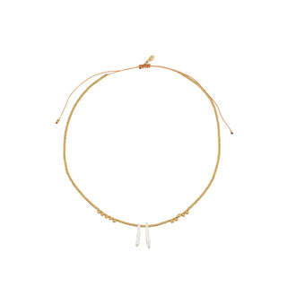 Gold-tone necklace featuring polished bead accents and two elongated freshwater pearls, finished with an adjustable sliding clasp for a refined contemporary look.