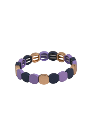 Tribal Mosaic Bracelet featuring alternating lavender and deep navy resin tiles accented with warm gold-toned details.