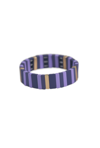 Purple Reign Bracelet showcasing alternating violet resin tiles with polished gold accents, creating a contemporary geometric design.